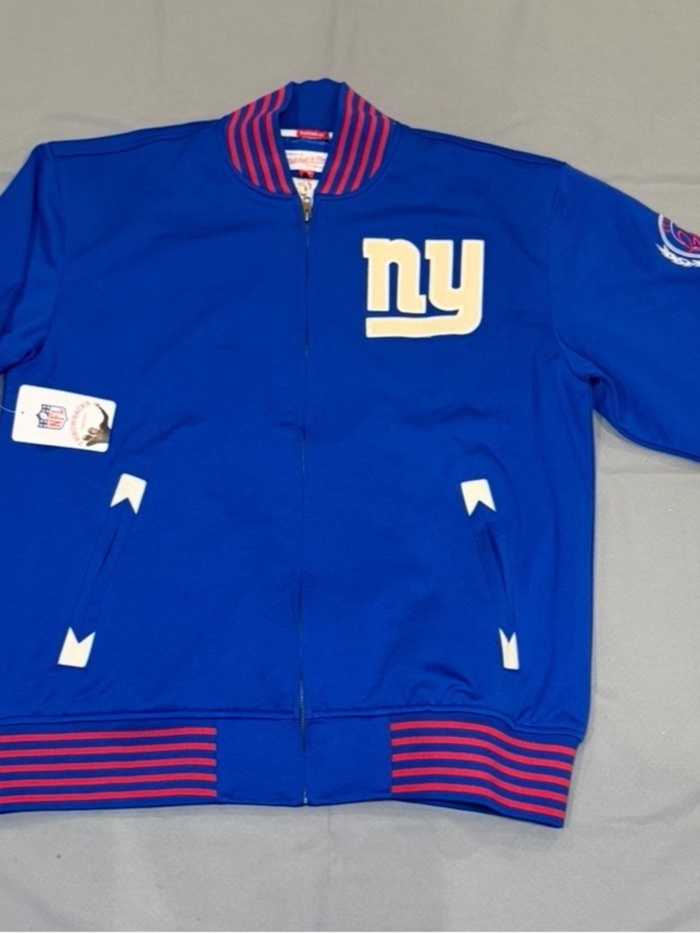 Mitchell & Ness Royal Blue NY Giants Logo Stadium Jacket with Red Trim